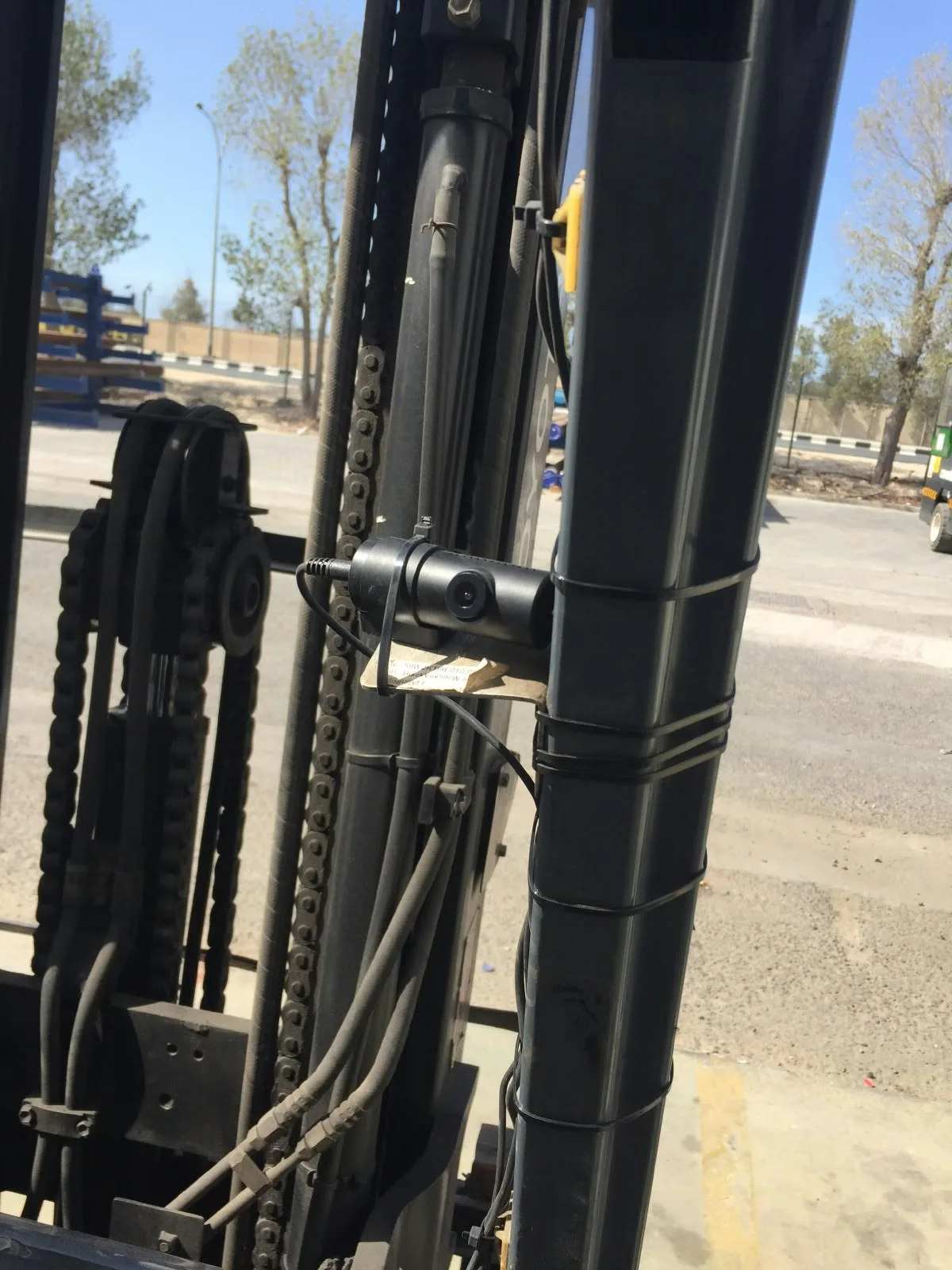 Camera mounting beside the forklift front structure