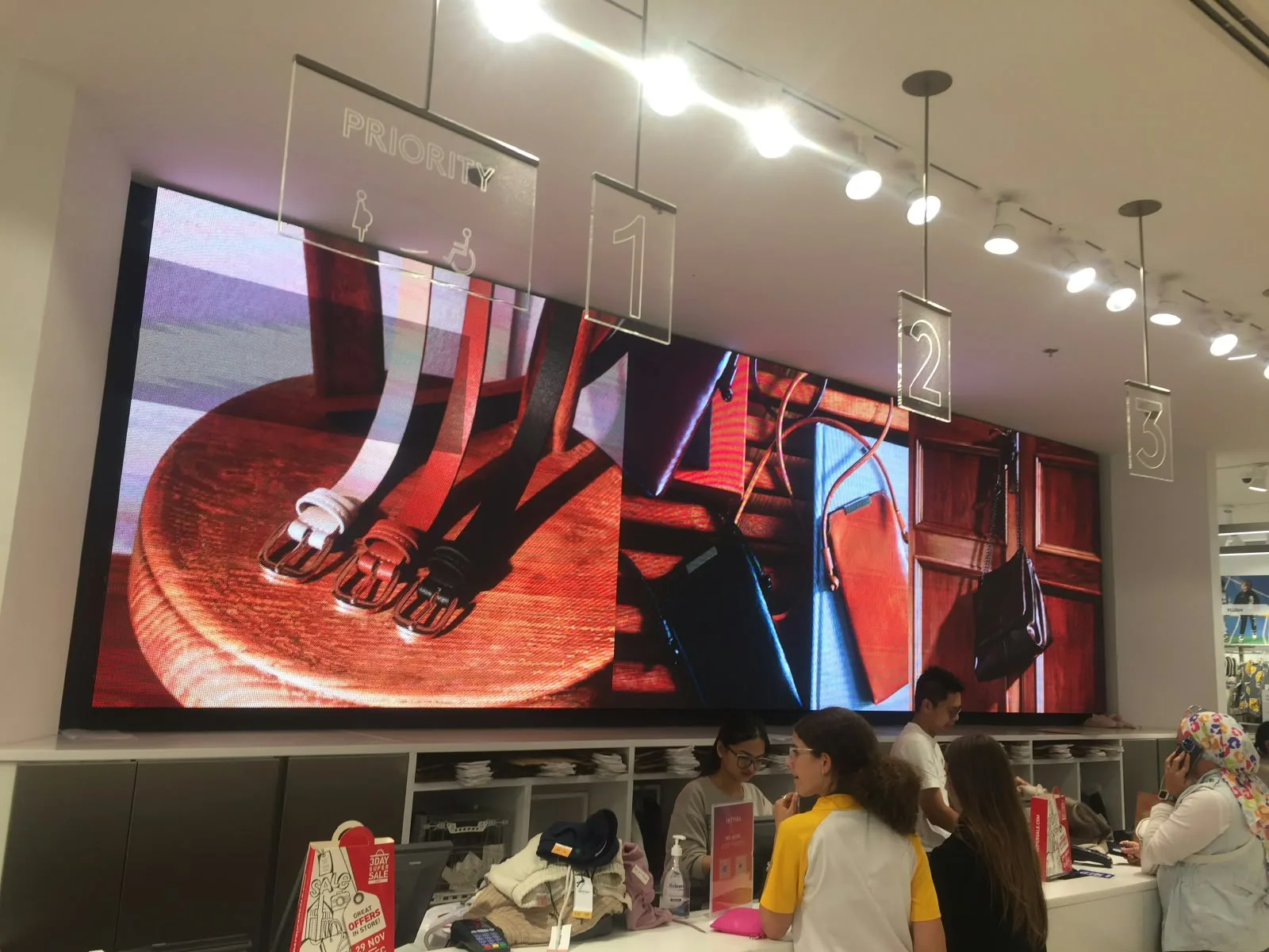 Large LED video wall displaying content in a retail store