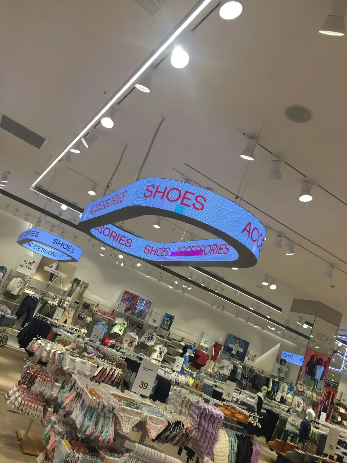 Suspended LED display in a retail store